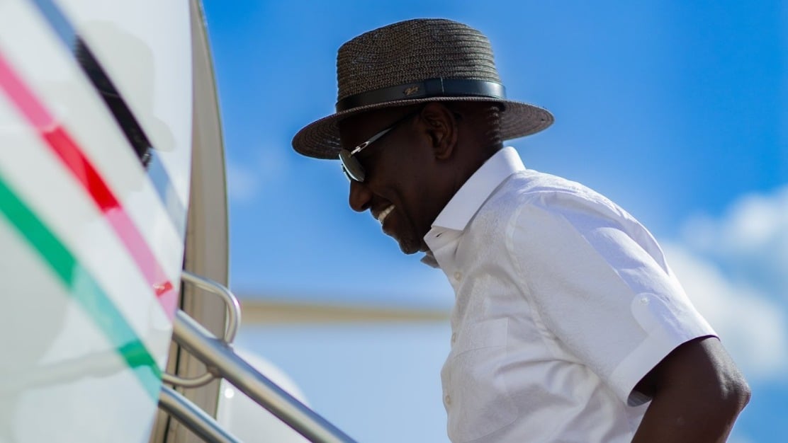 File image of President William Ruto boarding a plane